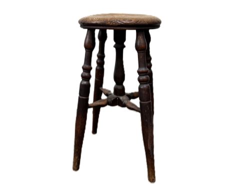 A 19th c. stool with elm seat on turned splayed supports, 57 x 30 cm.
