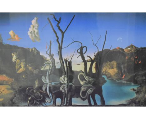 After Salvador Dali (Spanish 1904-1989) a coloured print 'Swans reflecting Elephants' after the 1937 original, mounted framed