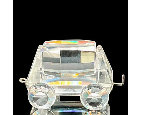 Depicts a clear wagon that is part of a locomotive with rhodium pull handle and attachment. This item has its original box wh