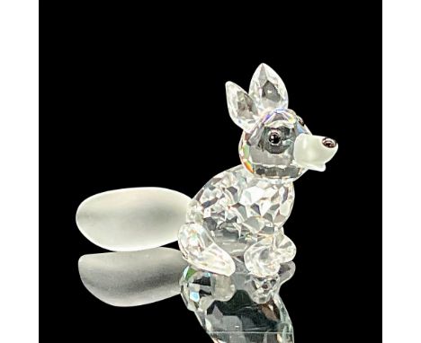 This silver Swarovski crystal mini sitting fox was part of the Woodland Friends collection. The sitting fox has a frosted nos