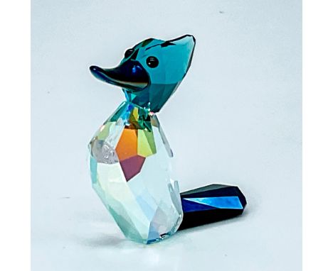 Sold as limited-edition piece in 2010. Body made from Aurora borealis crystal and light azure; head made from indicolite crys
