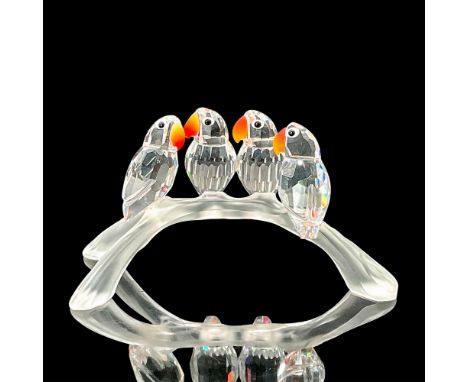 This set of 4 baby lovebirds sitting on a branch were part of the Feathered Beauties theme. The four faceted clear crystal Lo