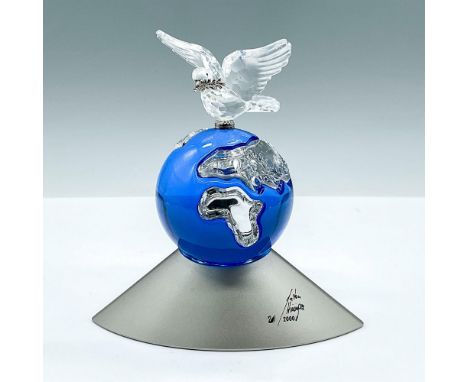 This exquisite crystal Planet was designed to celebrate the new Millennium and features a stunning sapphire blue globe with c