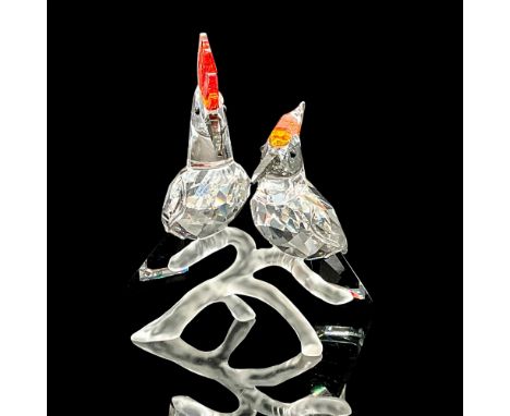 Fully faceted clear crystal body, black Diamond crystal beak, honey brown Topaz crystal crown and Jet-black tail. These color