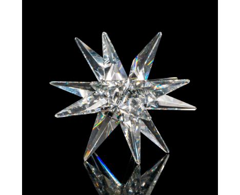 Lead crystal part of Our Candleholders collection and was designed to holder a single candle. Swarovski etched backstamp. Thi