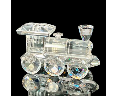 Clear body, beautiful detail on smokestack, wheels and roof. Swarovski etched backstamp. This item has its original box which