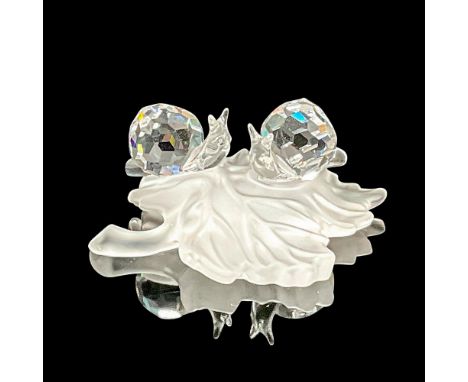 These Swarovski crystal baby snails on a vine leaf were members of the In the Secret Garden collection. The baby snails are m