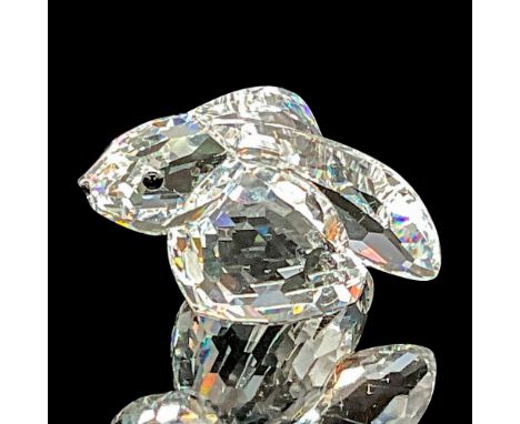 This Swarovski crystal bunny rabbit was part of the In a Summer Meadow collection. He is made from clear faceted crystal and 