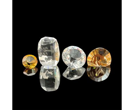 This Swarovski grouping features two elegant chaton's in clear and green, a charming clear paperweight with a graceful horse 