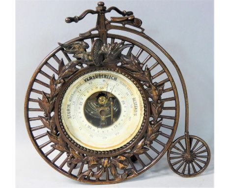 A German vintage brass Ordinary bicycle barometer, the 9 cm cm dial with German instruction, the case stamped D &amp; R, heig