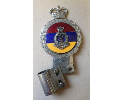 A British Army Medical Corps vintage car bumper badge, by Gaunt of London. 