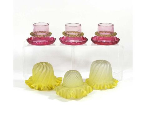 A set of three cranberry glass light shades, aperture 6cm, together with three similar yellow shades (6)