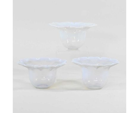 A pair of vaseline glass light shades, aperture 2.5cm, together with another similar (3)All three are dirty and have very lig
