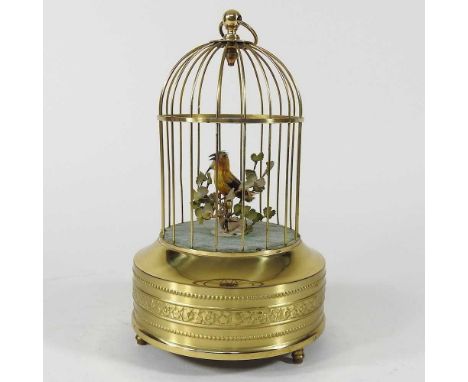 A bird cage automaton, 20th century, with a clockwork singing bird, 24cm highDoes not wind correctly