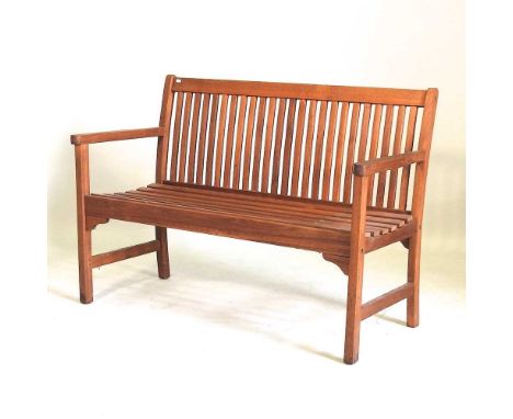 A wooden garden bench, on square legs122w x 56d x 85h cmLooks quite recent and is solid with only light weathering, but not h