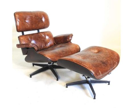 A 1960's style brown leather upholstered lounge chair and matching footstool, late 20th century, after a design by Charles an