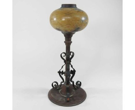 A painted glass oil lamp, with a metal base, 42cm highOverall quite dirty with wear to the painted decoration, the metal very