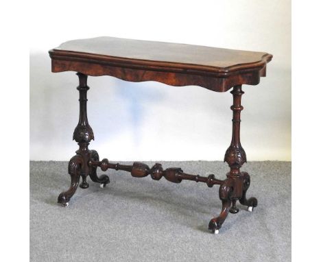 A Victorian burr walnut folding card table, with a hinged top, on standard end supports99w x 51d x 72h cm