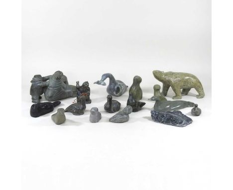 A collection of 20th century Inuit stone carvings, to include a sleeping figure signed Joseph Kark, polar bear, signed Tuga, 