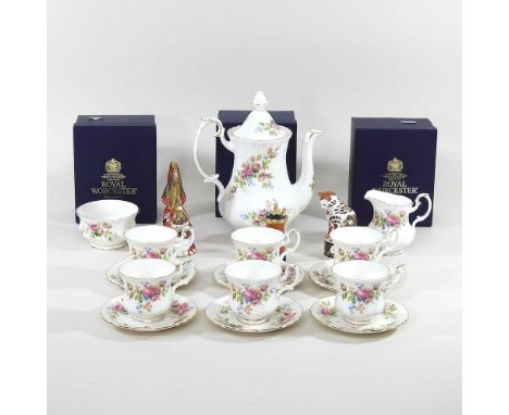 A Royal Worcester model of a cockerel, 13cm high, boxed, together with two other models and a Royal Albert Moss Rose coffee s