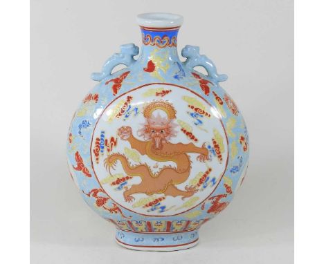 A Chinese porcelain vase, 20th century, of moon flask shape, decorated with a dragon, 36cm highOverall slightly dirty, but in