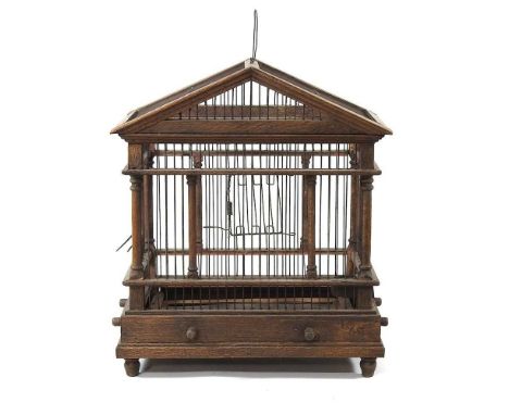 A 19th century wooden bird cage, of architectural form, 44cm high