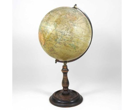 A Geographia eight inch terrestrial globe, early 20th century, on a turned wooden stand, 37cm high