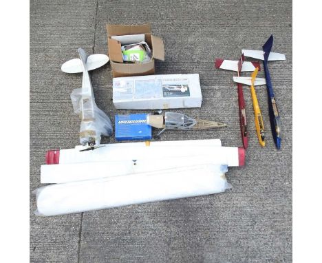 A collection of model plane parts and accessories