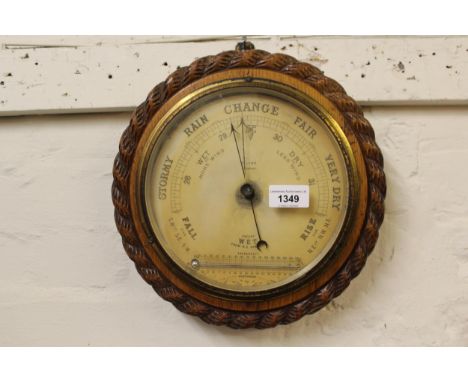 W. Last of Sudbury, circular oak rope pattern aneroid barometer 