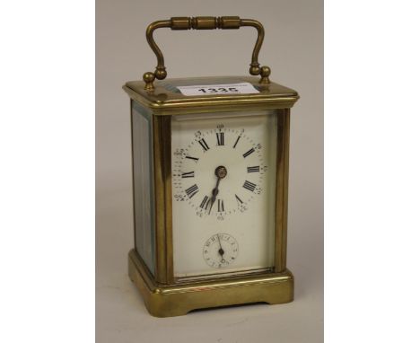 Small 20th Century brass cased carriage clock with alarm function having enamel dial with Roman numerals and subsidiary alarm