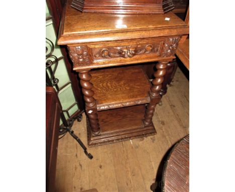 19th Century oak three tier side table, the square moulded top above a mask head drawer and barley twist supports above a pli