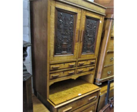 Maple & Co. burr ash and rosewood crossbanded compactum side cabinet, the moulded cornice above a pair of carved panel doors 