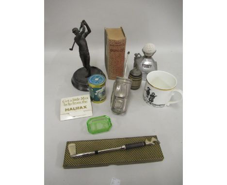 Quantity of golfing related items including a spelter figure of a golfer and a table lighter 