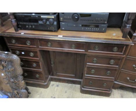 Victorian mahogany twin pedestal desk, with a leather inset top above nine drawers, on plinth bases with centre cupboard, (wi