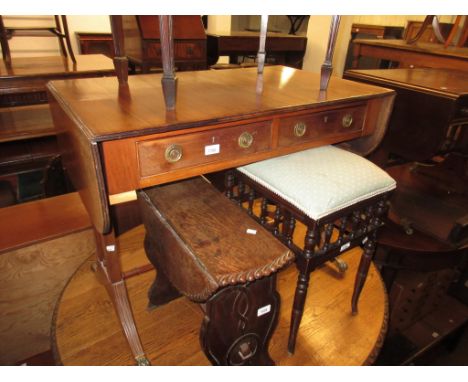 20th Century mahogany drop-leaf sofa table in Regency style, the reeded top above two drawers, end supports and reeded sabre 