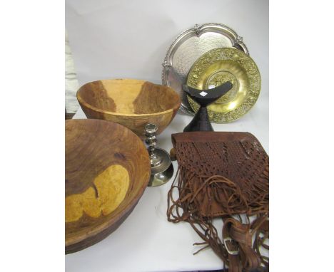 Two native carved hardwood dug-out fruit bowls, West African carved hardwood head rest, a leather shoulder bag, plated salver