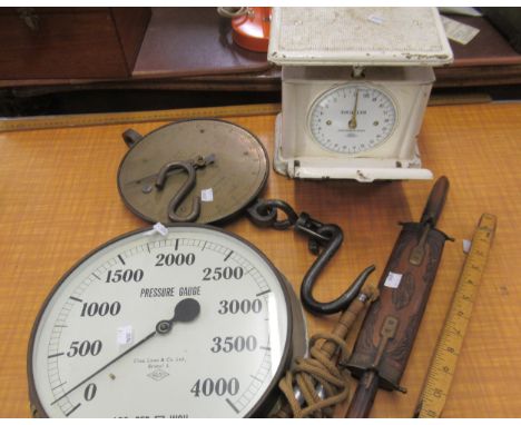 Large brass pressure gauge, a Salter's spring balance, cast iron Bellmont weighing scale, skipping rope, carving set and a fo