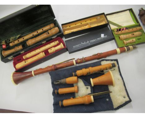 Two recorders by Moeck, in original cases, together with a Schott treble recorder, boxed, and another recorder by Mollenhauer