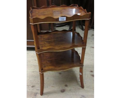 Reproduction yew wood three tier etajere, together with a yew wood half round hall table and a yew wood leather inset lamp ta