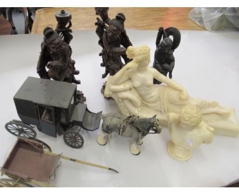 Pair of oriental carved hardwood lamp bases together with a similar smaller figure, a Melba pottery figure of a horse and two