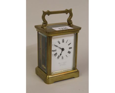 Small 20th Century brass cased carriage clock, the enamel dial with Roman numerals, inscribed Wray, Son & Perry, 4.5ins high 