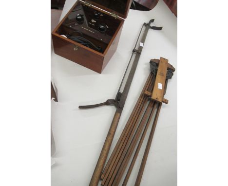 Mahogany cased electrostatic device (high frequency generator), fruit picking tool and a Popular folding easel 