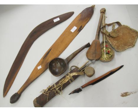 Aboriginal hardwood boomerang, a wooden opium scale together with a quantity of various other native carved items 