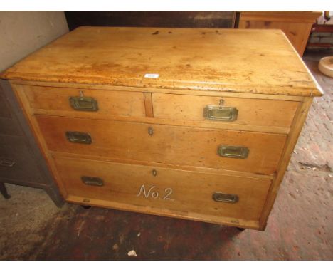 19th Century pine military chest of two short over two long drawers, with flush brass handles and side carrying handles on tu