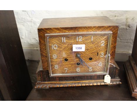 Art Deco oak mantel clock with a three train movement striking on gongs together with a Continental oak cased mantel clock an