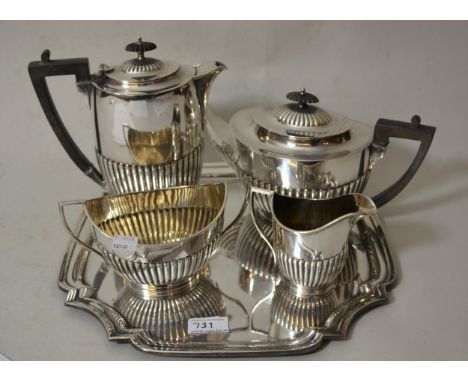 Walker & Hall silver plated four piece half fluted design tea service, together with a silver plated tray 