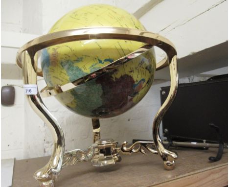 20th Century stone and inlaid World globe on gilt metal stand, 19.5ins high 