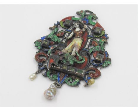 19th Century Continental white metal enamel decorated pendant with applied figure of a standing female before an arch, set wi