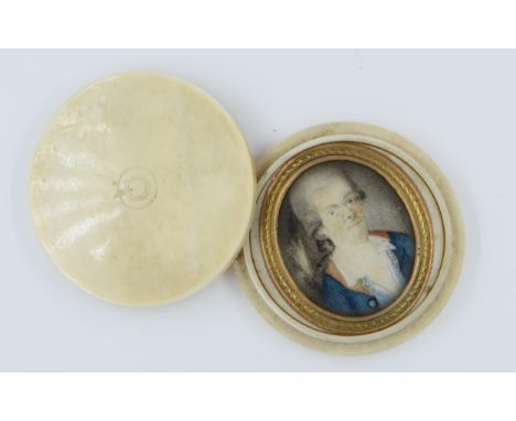 19th Century oval gilt metal mounted head and shoulder miniature portrait of a gentleman (at fault), housed in an ivory case 