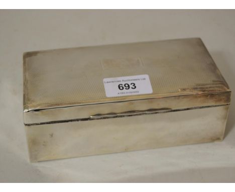 Rectangular silver cigarette box, with engine turned cover 